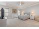 Spacious bedroom with carpeted floor, large windows, and plenty of storage at 4402 Boxwood St., Myrtle Beach, SC 29577