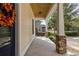 Inviting front porch with stone columns and a lovely wreath at 4402 Boxwood St., Myrtle Beach, SC 29577