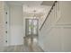 Bright entryway with double doors and staircase at 8001 Mcsweeney Ct., Myrtle Beach, SC 29588