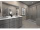 Modern bathroom with double vanity, large shower, and a relaxing atmosphere at 1213 Glenrose Ct Nw, Calabash, NC 28467