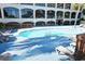 Inviting resort-style pool with plenty of lounge chairs at 4800 S Ocean Blvd. # 1522, North Myrtle Beach, SC 29582