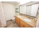 Bathroom with double vanity, granite countertop, and tile floor at 4800 S Ocean Blvd. # 1522, North Myrtle Beach, SC 29582