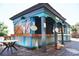 Quaint beachside concession stand with wooden accents and a teal colored exterior at 4800 S Ocean Blvd. # 1522, North Myrtle Beach, SC 29582