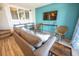 Living Room with a sofa, chairs, and a view into the kitchen at 4800 S Ocean Blvd. # 1522, North Myrtle Beach, SC 29582