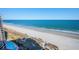 Aerial View showcasing beach, pool, and oceanfront condo building at 4800 S Ocean Blvd. # 1522, North Myrtle Beach, SC 29582