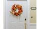 White front door adorned with a festive autumnal wreath at 2180 Waterview Dr. # 733, North Myrtle Beach, SC 29582