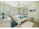 Cozy bedroom with a queen bed and wicker furniture at 206 56Th Ave. N, North Myrtle Beach, SC 29582