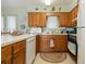 Fully equipped kitchen with wood cabinets and a dishwasher at 206 56Th Ave. N, North Myrtle Beach, SC 29582