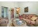 Comfortable sitting area with wicker furniture and access to a bathroom at 206 56Th Ave. N, North Myrtle Beach, SC 29582