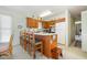 Kitchen boasts a breakfast bar, ample cabinetry, and modern appliances at 206 56Th Ave. N, North Myrtle Beach, SC 29582