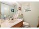 Small bathroom with a toilet and sink at 206 56Th Ave. N, North Myrtle Beach, SC 29582