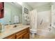 Well-lit bathroom with shower/tub combo at 206 56Th Ave. N, North Myrtle Beach, SC 29582