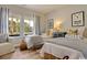 Bright bedroom with twin beds, featuring a light color scheme and natural light at 5030 Selene Ct., Myrtle Beach, SC 29588