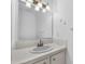 Simple bathroom with single vanity, updated faucet, and large mirror at 2925 Carriage Row Ln. # 134, Myrtle Beach, SC 29577