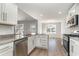 Eat-in kitchen with granite countertops and stainless steel appliances at 1006 Stump Rd., Conway, SC 29526