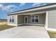 Covered patio with concrete flooring, ceiling fan and access from the house at 1006 Stump Rd., Conway, SC 29526