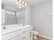 Double vanity bathroom with white cabinets and a large mirror at 1006 Stump Rd., Conway, SC 29526