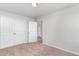 Bedroom with carpet, double doors to closet and hallway access at 1006 Stump Rd., Conway, SC 29526