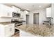 Modern kitchen, granite countertops, and stainless steel appliances at 1006 Stump Rd., Conway, SC 29526