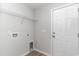 Laundry room with shelving, hookups and door to outside at 1006 Stump Rd., Conway, SC 29526