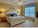 Main bedroom with king-size bed and coastal decor at 101 Georges Bay Rd., Surfside Beach, SC 29575