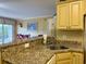 Kitchen features granite countertops and a convenient breakfast bar at 101 Georges Bay Rd., Surfside Beach, SC 29575