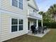 House exterior showcasing a patio, deck, and backyard at 101 Georges Bay Rd., Surfside Beach, SC 29575