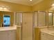 Bathroom with a shower and double vanity at 101 Georges Bay Rd., Surfside Beach, SC 29575