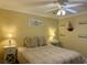 Bedroom with a double bed, nightstands, and ceiling fan at 101 Georges Bay Rd., Surfside Beach, SC 29575