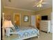 Bedroom with a queen bed, ensuite bathroom access, and dresser at 101 Georges Bay Rd., Surfside Beach, SC 29575