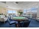 Common area game room with pool tables and comfortable seating at 2709 Ocean Blvd. S # 1202, Myrtle Beach, SC 29577