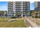 Beach access boardwalk leading to a condo building at 2709 Ocean Blvd. S # 1202, Myrtle Beach, SC 29577
