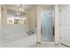 Bathroom with soaking tub, walk-in shower, and updated fixtures at 2709 Ocean Blvd. S # 1202, Myrtle Beach, SC 29577