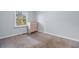 Bedroom with light walls, carpet, and a window with blinds at 4505 N Kings Hwy. # C3, Myrtle Beach, SC 29577