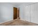 Simple bedroom with double door closet and neutral walls at 4505 N Kings Hwy. # C3, Myrtle Beach, SC 29577