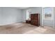 Bright bedroom with large window and wood furniture at 4505 N Kings Hwy. # C3, Myrtle Beach, SC 29577