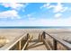 Wooden boardwalk leads to sandy beach at 4505 N Kings Hwy. # C3, Myrtle Beach, SC 29577