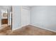 Cozy bedroom with neutral walls, carpeting, and double door closet at 4505 N Kings Hwy. # C3, Myrtle Beach, SC 29577
