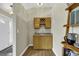 Convenient wet bar with wood cabinetry, granite countertop, and wine rack at 153 Garden Ave., Georgetown, SC 29440