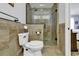 Bathroom with toilet and glass shower door at 153 Garden Ave., Georgetown, SC 29440