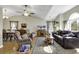 Spacious living room with hardwood floors, comfortable seating, and a dining area at 153 Garden Ave., Georgetown, SC 29440