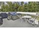 Deck with hot tub, table and chairs, and grill at 153 Garden Ave., Georgetown, SC 29440