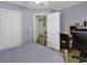 Bedroom with double bed, home office space, and double door closet at 153 Garden Ave., Georgetown, SC 29440