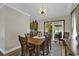 Dining area with wood table and chairs, access to sunroom at 153 Garden Ave., Georgetown, SC 29440