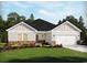 Attractive one-story home with a two-car garage and landscaping at 680 Blackthorne Circle Nw, Calabash, NC 28467