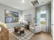 Relaxing game room with comfortable seating and golf equipment display at 680 Blackthorne Circle Nw, Calabash, NC 28467