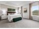 Main bedroom with a king-size bed, neutral decor and natural light at 680 Blackthorne Circle Nw, Calabash, NC 28467
