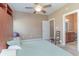 Spacious bedroom with a queen bed and ensuite bathroom access at 1018 Foxtail Dr., Longs, SC 29568