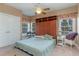 Guest bedroom with a built-in murphy bed and large windows at 1018 Foxtail Dr., Longs, SC 29568