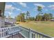 Private deck overlooking a beautiful golf course with lush landscaping at 1018 Foxtail Dr., Longs, SC 29568